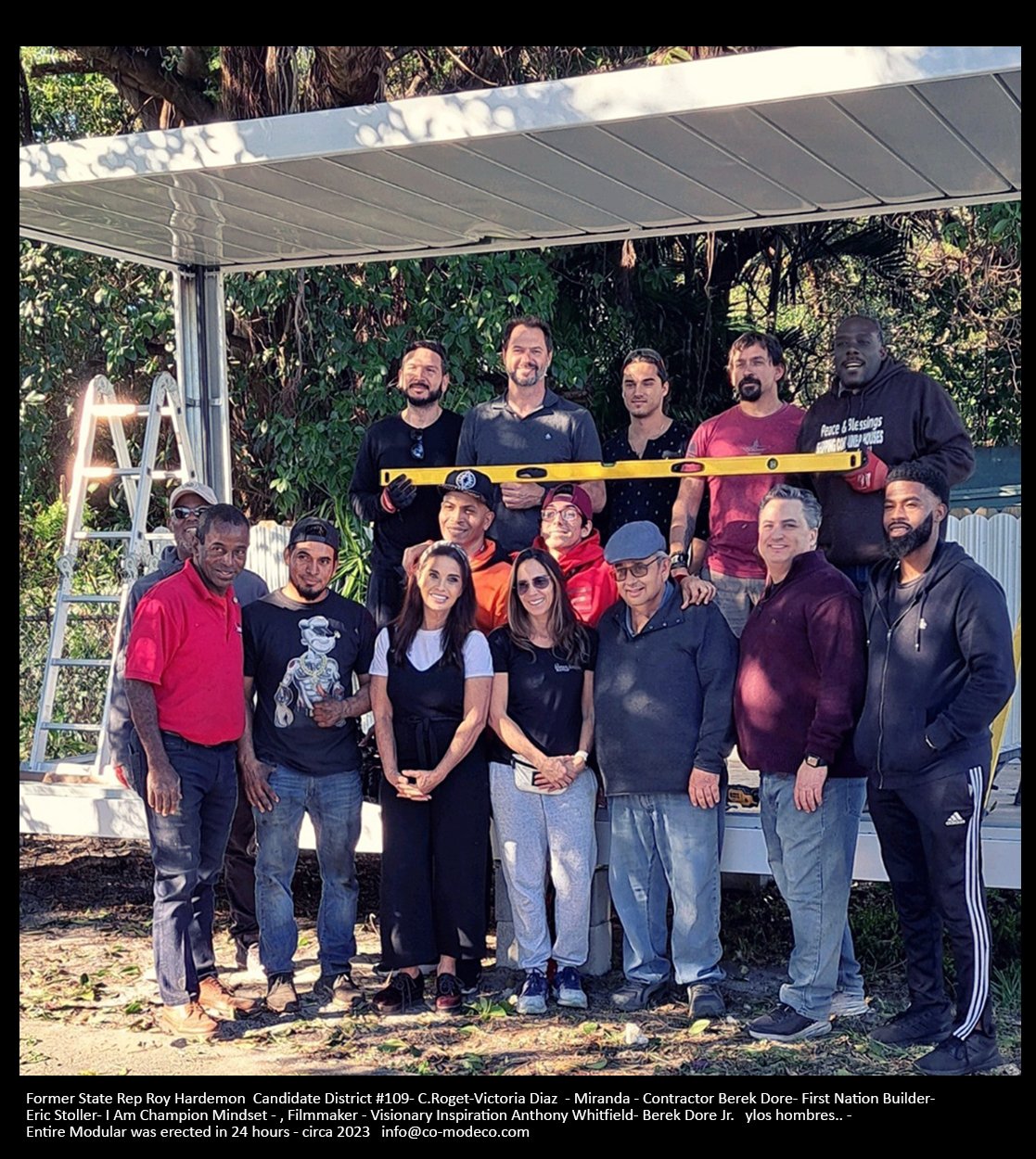 A group of people posing for a photo Description automatically generated